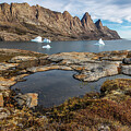 Clear fjord waters and the mountains of the Bjorneoer Islands, or Bear Islands, situated in Scorseby Sund by Jane Rix