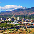Downtown Reno skyline, Nevada, with hotels, casinos and surrounding mountains Photograph by Miroslav Liska