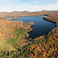 Fall Foliage at Peacham Pond - Peacham, Vermont by John Rowe