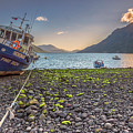 Fishing boat moored in the Hornopiren fjord at golden hour Photograph by Henri Leduc Fishing boat moored in the Hornopiren fjord at golden hour Photograph by Henri Leduc