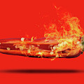 Half a red chili pepper on fire with seeds Photograph by Simon Bratt Half a red chili pepper on fire with seeds Photograph by Simon Bratt
