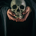 Hands Holding Skull by Carlos Caetano Hands Holding Skull by Carlos Caetano