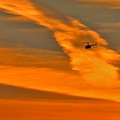 Helicopter Approaching at Sunset Photograph by Linda Stern Helicopter Approaching at Sunset Photograph by Linda Stern