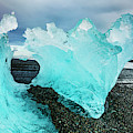 Icebergs on Jokulsarlon black beach, Iceland Photograph by Neale And Judith Clark Icebergs on Jokulsarlon black beach, Iceland Photograph by Neale And Judith Clark