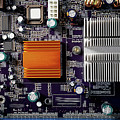 Mainboard of a pc with electronic components. Photograph by Bernhard Schaffer Mainboard of a pc with electronic components. Photograph by Bernhard Schaffer