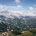 Man with a backpack looks at the Dachstein massif Photograph by Vaclav Sonnek Man with a backpack looks at the Dachstein massif Photograph by Vaclav Sonnek