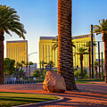 Mandalay Bay Resort and Casino on Las Vegas Boulevard with Palm Trees at Sunset by Miroslav Liska