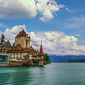 Oberhofen Castle on Lake Thun with Swiss Alps in Background, Switzerland by Miroslav Liska