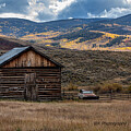 Old log barn in the mountains of Colorado by JBK Photo