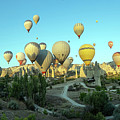 Panorama of bunch of colorful hot air balloon flying early morning in Cappadocia, Turkey against typical rock formation due to volcanic activity in love valley located in Goreme national park Photograph by Arpan Bhatia Panorama of bunch of colorful hot air balloon flying early morning in Cappadocia, Turkey against typical rock formation due to volcanic activity in love valley located in Goreme national park Photograph by Arpan Bhatia