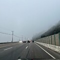 PCH in Pacific Palisades Cars travel down a foggy highway Los Angeles California USA 2024 by John Shiron