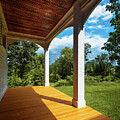 Porch overlooking a scenic Vermont landscape by Eric Killorin