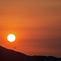 Red sunset and plane in flight Photograph by Hannes Roeckel Red sunset and plane in flight Photograph by Hannes Roeckel