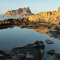 Reflection of rocks in the calm Mediterranean Sea at sunrise 1 Photograph by Adriana Mueller Reflection of rocks in the calm Mediterranean Sea at sunrise 1 Photograph by Adriana Mueller