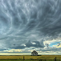 Schoolhouse and Stormy Skies by Mary Tastad