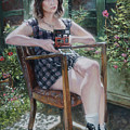Seated woman with camera by Martin Davey