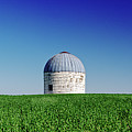 Solitary Silo in a ND wheat field Photograph by Peter Herman