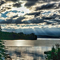 Sun Rays and Storm Clouds Over Rangeley Maine Photograph by Russel Considine Sun Rays and Storm Clouds Over Rangeley Maine Photograph by Russel Considine