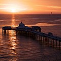 Sunrise over Llandudno pier 2 by Christopher Rowlands Sunrise over Llandudno pier 2 by Christopher Rowlands