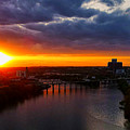 Sunset over the James and city Photograph by Stephen Dorton