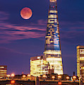 The Shard and red moon, London Photograph by Neale And Judith Clark The Shard and red moon, London Photograph by Neale And Judith Clark