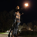 Torchbearer statue at the University of Tennessee at night Photograph by Eldon McGraw Torchbearer statue at the University of Tennessee at night Photograph by Eldon McGraw