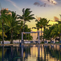 Tropical Resort Poolside at Sunset in Mauritius by Miroslav Liska