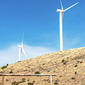 Two Wind Turbines above US 97 by Tom Cochran
