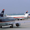 US Airways Boeing 737s at Washington Reagan Airport Photograph by Erik Simonsen US Airways Boeing 737s at Washington Reagan Airport Photograph by Erik Simonsen