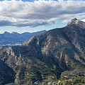 Clouds and the Sierra de Bernia mountain range Photograph by Adriana Mueller Clouds and the Sierra de Bernia mountain range Photograph by Adriana Mueller