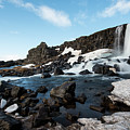Waterfall flowing into the river, Iceland Photograph by Michalakis Ppalis Waterfall flowing into the river, Iceland Photograph by Michalakis Ppalis