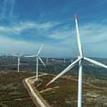 Windmills or wind turbine on wind farm Photograph by Mikhail Kokhanchikov Windmills or wind turbine on wind farm Photograph by Mikhail Kokhanchikov