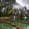 Wooden boats on the peaceful lake. Lago di braies, Italy Photograph by Michalakis Ppalis Wooden boats on the peaceful lake. Lago di braies, Italy Photograph by Michalakis Ppalis